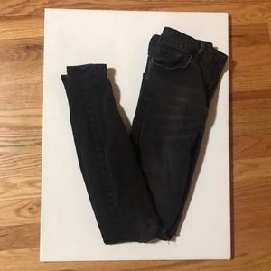 Black jeans with ripped knees